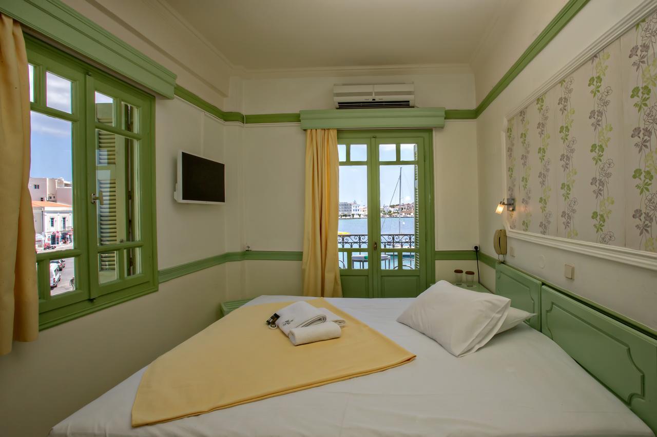 Aegli 1876 Hotel Tinos Bagian luar foto